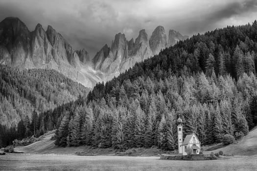 ranui church in south tyrol funes valley dolomites italy view in b&w