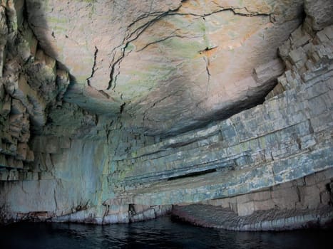 vis island croatia turquoise water and rock cliff, transparent clear sea water during a bright summer day