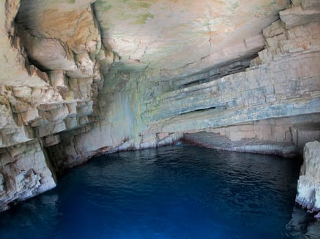 vis island croatia turquoise water and rock cliff, transparent clear sea water during a bright summer day