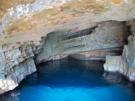 vis island croatia turquoise water and rock cliff, transparent clear sea water during a bright summer day