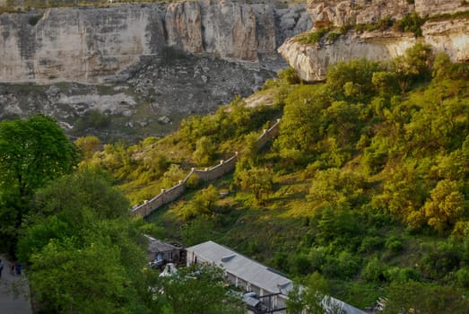 On the left in the corner you see a tourist route, and at the foot of the mountain there is a private houses.