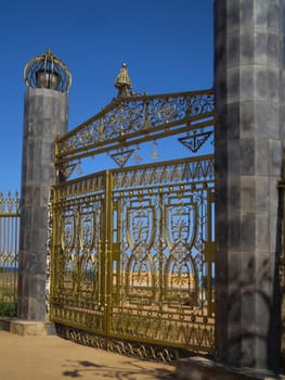 The gate of the unfinished science center on the Issyk-Kul River. Kyrgyzstan.