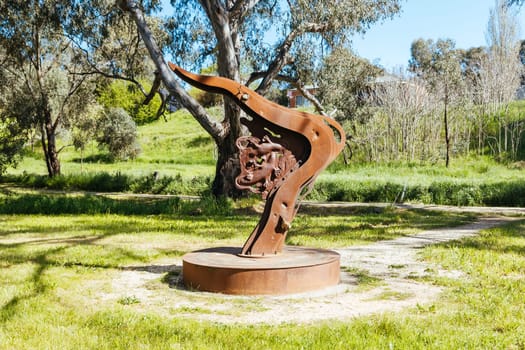 River landscape on the Campaspe River and the famous Platypus Compass sculpture during the afternoon near Axedale in Victoria, Australia.