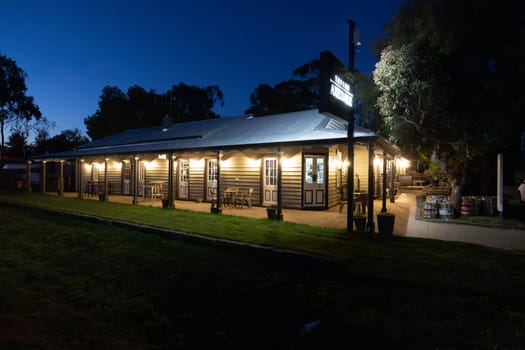 AXEDALE, AUSTRALIA - SEPTEMBER 24: Historic Victorian architecture of the Axedale Tavern on a warm spring evening in Axedale, Victoria, Australia in 2023