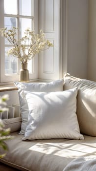 Warm sunlight bathes a comfortable nook, featuring plush cushions and a vase of delicate flowers, ideal for branding mockups