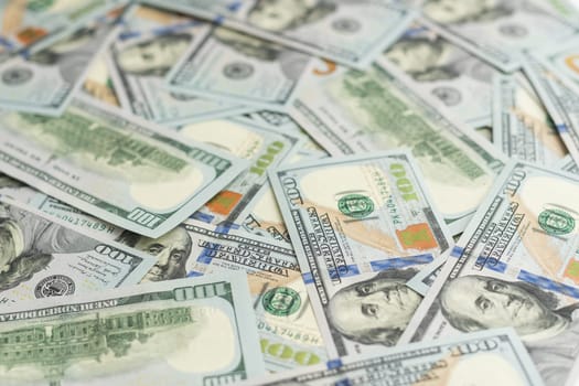 Texture of dollar bills. One hundred dollars. Close-up. High quality photo
