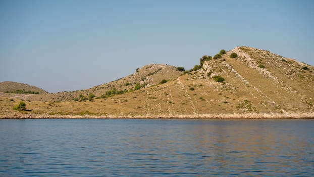 Sunny scene with picturesque dry hills in Dugi Otok island, Adriatic Sea, Croatia