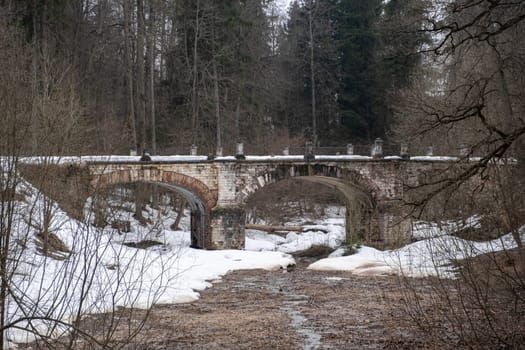 Nature, woods and an old bridge on the grounds of the old homestead. arena in the Serednikovo estate in the Moscow region, a park-manor of the end of the XVIII beginning of the XIX century