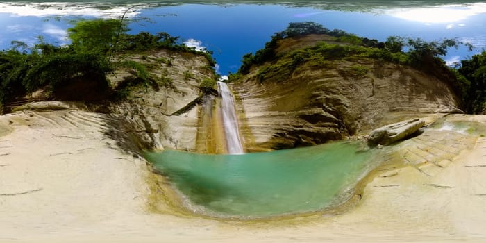 A tropical waterfall in a mountain canyon. Dao Falls. Philippines. 360 panorama VR.