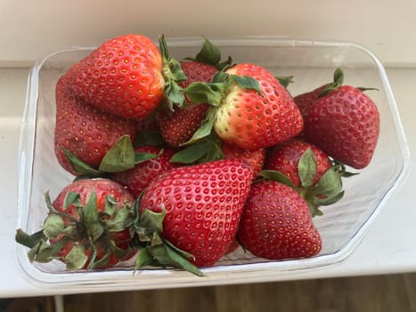 Fresh spring strawberries in a the bowl