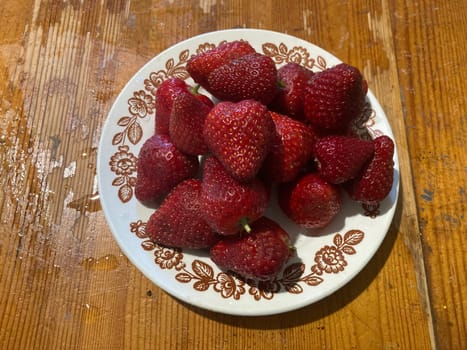 Fresh spring strawberries in a the bowl