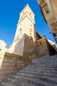 Valletta, Malta, April 03, 2024. the bell tower of St. Paul's cathedral in the city center