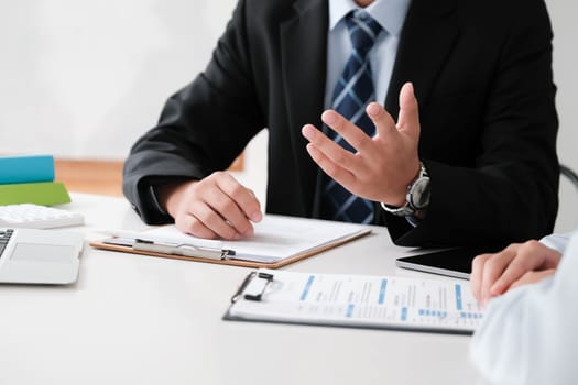 A candidate engaged in a job interview with a hiring manager, discussing qualifications and employment opportunities.