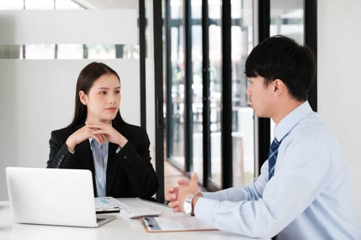 A candidate engaged in a job interview with a hiring manager, discussing qualifications and employment opportunities.