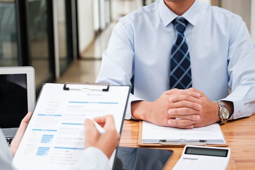 A candidate engaged in a job interview with a hiring manager, discussing qualifications and employment opportunities.