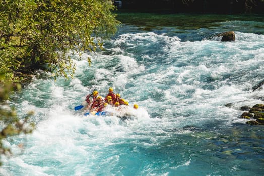 Antalya, Turkey - August 10, 2023: Rafting on a big rafting boat on the river in Antalya Koprulu Canyon.