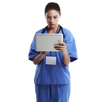 Healthcare, tablet and woman doctor in studio for health newsletter, information or research on white background. Digital, app or nurse with website, search or scroll for Telehealth communication.