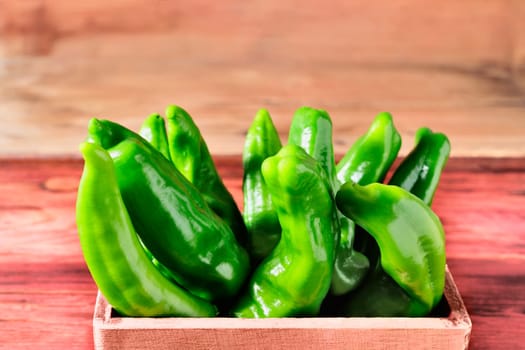 Sweet green chili peppers also known as the golden Greek pepper or Tuscan pepper ,used as ingredient in salads and compotes