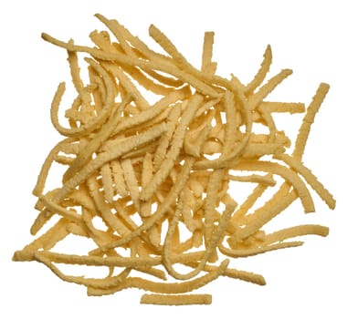 Raw wheat noodles on isolated background, top view. Spaetzle pasta