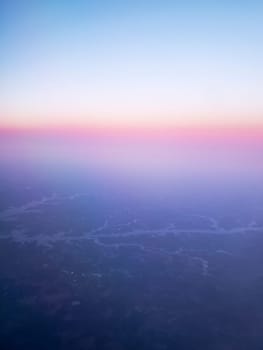 View of a Man-made Lake Seen From an Airplane at Sunrise