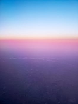 View of a Man-made Lake Seen From an Airplane at Sunrise