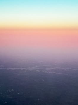 View of a Man-made Lake Seen From an Airplane at Sunrise