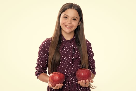 Teen girl child with apple, isolated portrait