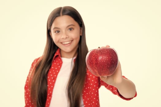 Fresh fruit. Teenager girl hold apples on white isolated studio background. Child nutrition. Portrait of happy smiling teenage child girl