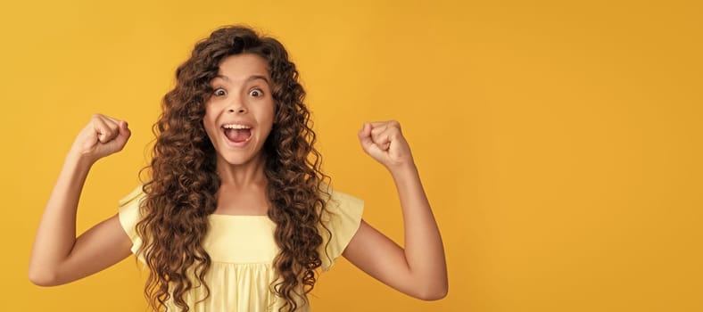 happy kid with long curly hair and perfect skin celebrate success, healthy hair. Child face, horizontal poster, teenager girl isolated portrait, banner with copy space