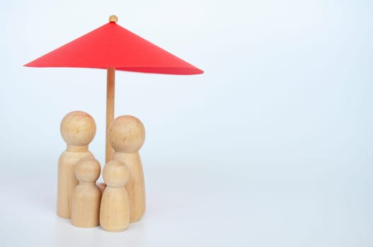 Red umbrella and wooden family doll figures with customizable space for text.
