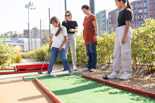 Golf course group of friends people with children posing standing. High quality photo