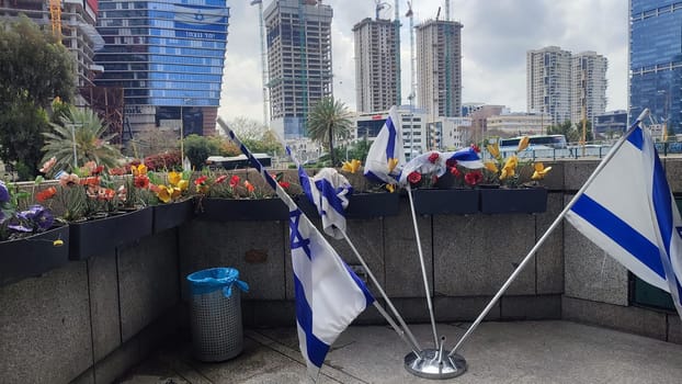 09 April 2024 Tel-Aviv, Israel flags Israeli country, building . High quality photo