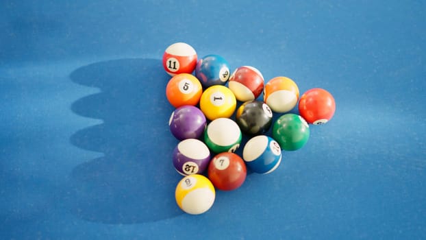 Photo of billiard balls placed on the pool table