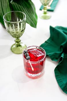 Blackberry cocktail on a light background. banner, menu, recipe place for text, top view. High quality photo