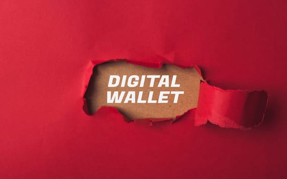A red background with a hole in it and the words digital wallet written on it. The hole in the paper suggests a sense of opening or revealing something new