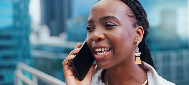 Black woman, phone call and business discussion in city, balcony or rooftop for outdoor communication. Face of African female person or employee talking on mobile smartphone for conversation in town.