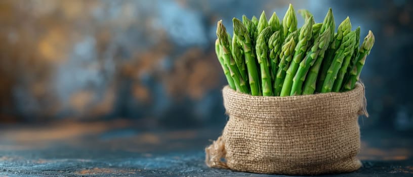 Green asparagus on an abstract background. Selective soft focus.