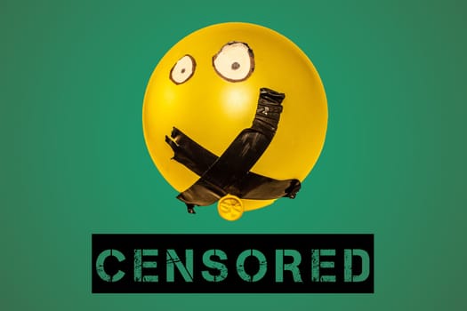 Illuminate the stifling effects of censorship and cancel culture with this evocative concept image portraying a balloon with its mouth sealed shut by tape.