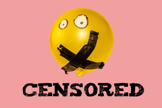 Illuminate the stifling effects of censorship and cancel culture with this evocative concept image portraying a balloon with its mouth sealed shut by tape.