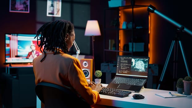 University pupil working with artificial intelligence system for machine learning, writing code in programming language. Girl uses deep learning algorithms and processing information. Camera B.