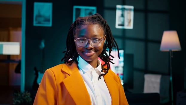 Portrait of hardworking dedicated girl attending online classes and webinars, improving her education and acquiring new academic skills. Smiling student taking career courses at home. Camera B.