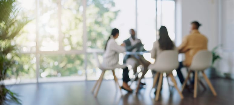 Business meeting, blurred background and people in office for teamwork, collaboration and planning, Partnership, negotiation and group in solidarity for growth, consulting and corporate solution.