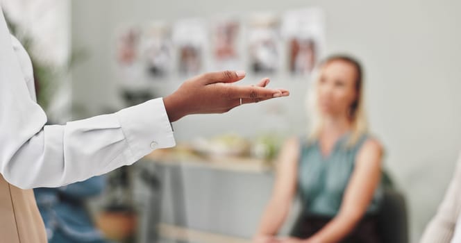 Hand, psychologist and session with group therapy in closeup for advice, consultation and mental health. People, therapist and guide with counselling, addiction or communication for empathy in circle.