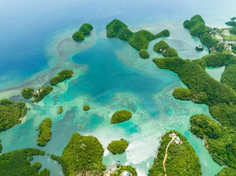 Aerial drone of bay and lagoon with islands. Seascape in the tropics. Sipalay, Negros, Philippines.