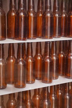 Display of amber glass bottles .