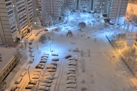 Night city after snowfall in the Moscow, Russia