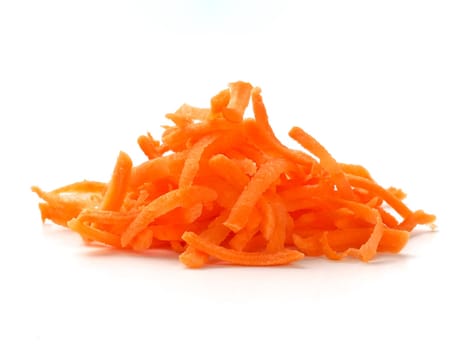 Pile of fresh organic shredded carrots. Raw grated carrots isolated on white with clipping path.