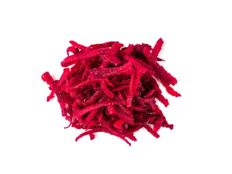 Grated beetroot isolated on white with clipping path. Heap of shredded beet root salad isolated on white background. Top view or flat lay.