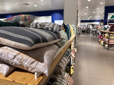 Sofa cushions on shelves of a department home goods store