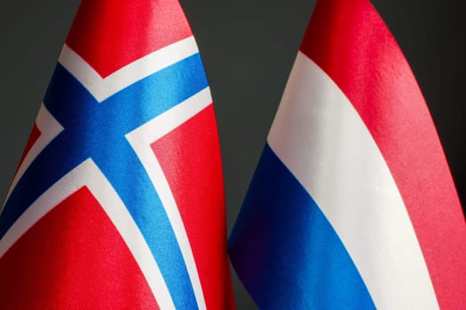 Close up of the flags of Norway and the Netherlands.